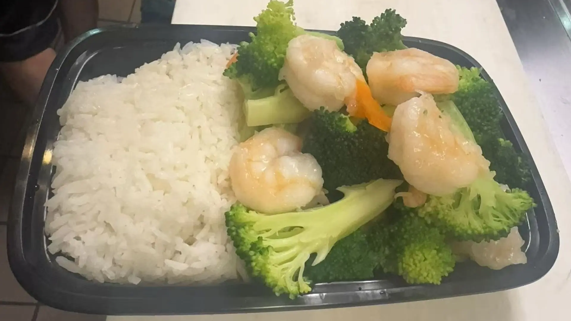 Shrimp and broccoli with white rice, a Chinese Restaurant in Rochester.