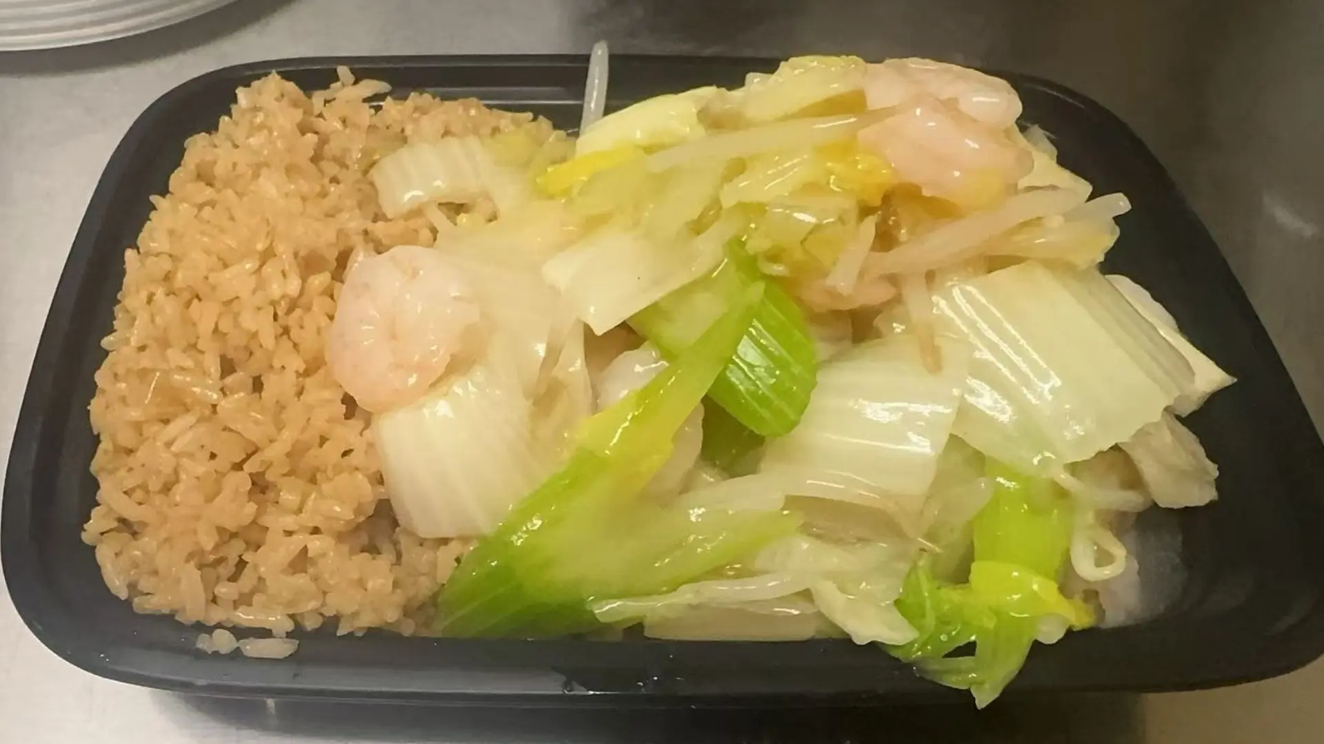 Shrimp stir-fried with veggies and rice, a Chinese Restaurant in Rochester.